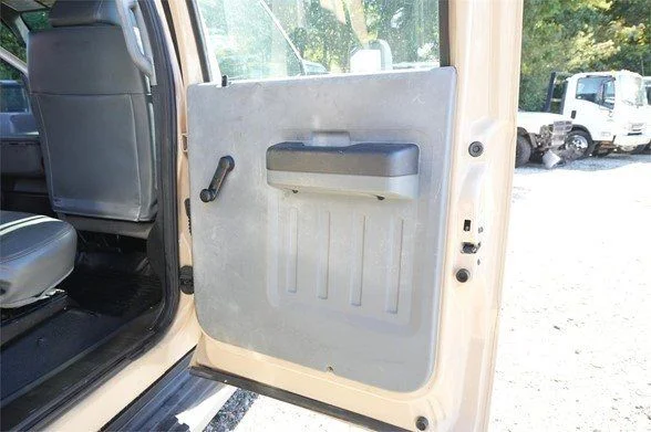Used 2013 Brown Ford XL Dump Truck image 17