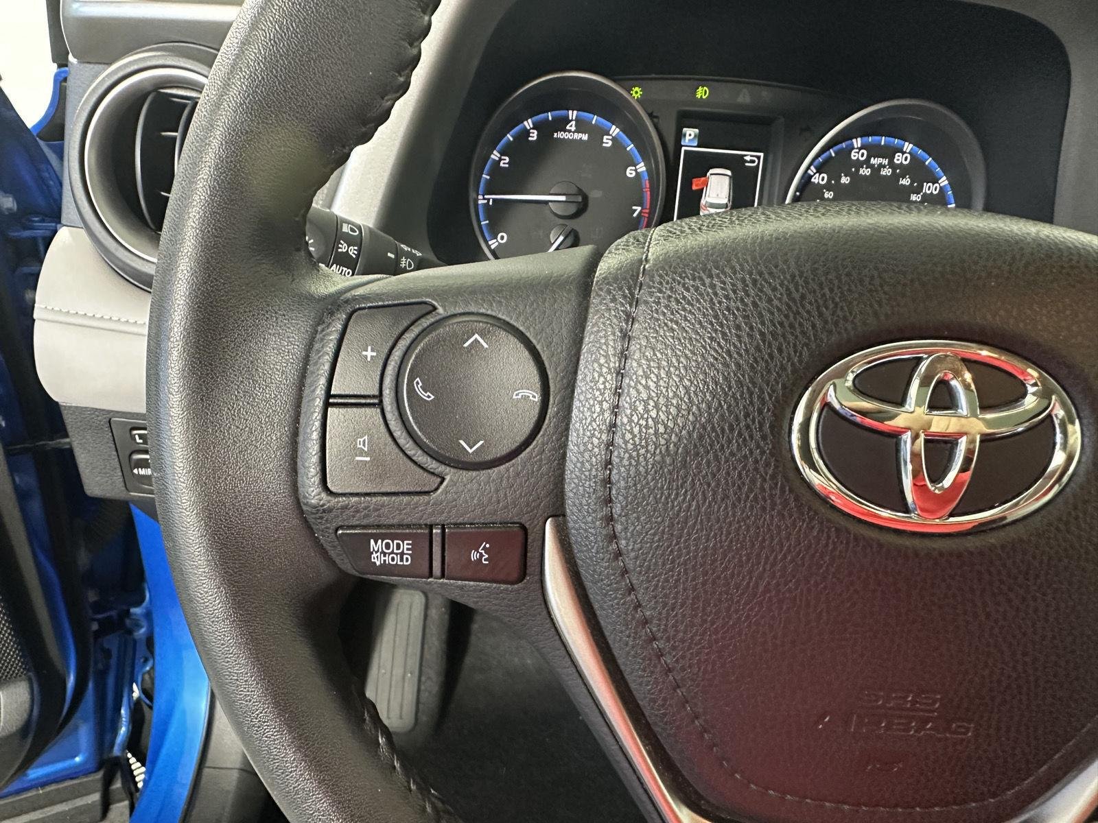 Used 2017 Electric Storm Blue Toyota XLE image 11