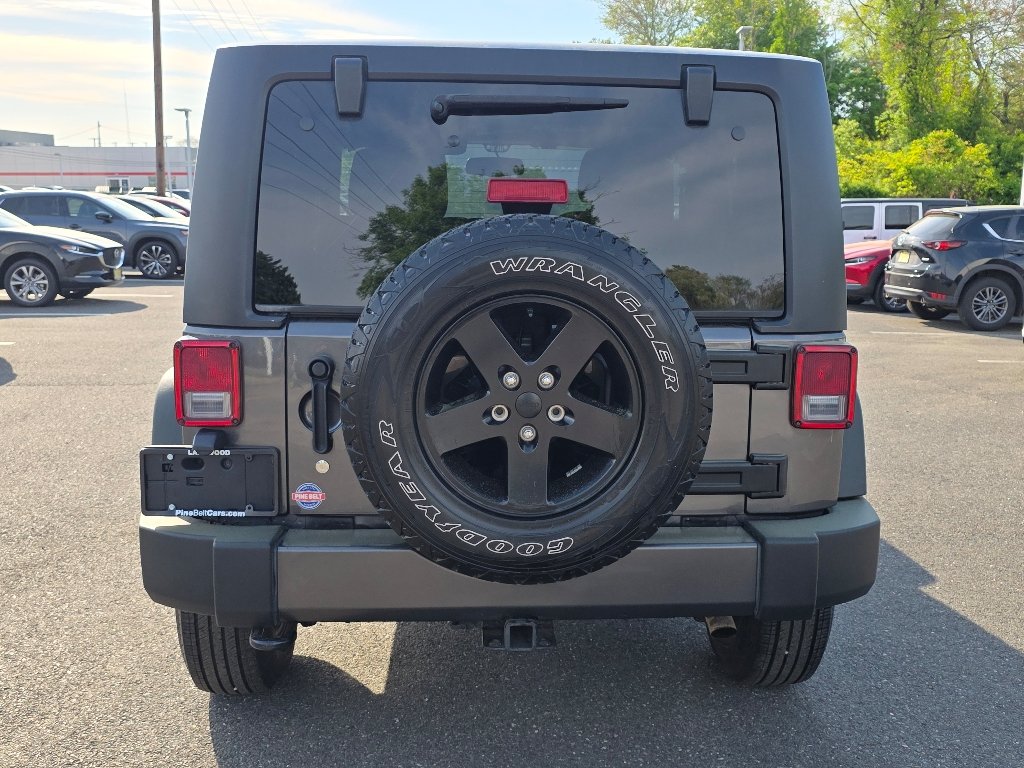 Used 2016 Granite Crystal Metallic Clear Coat Jeep Sport image 15