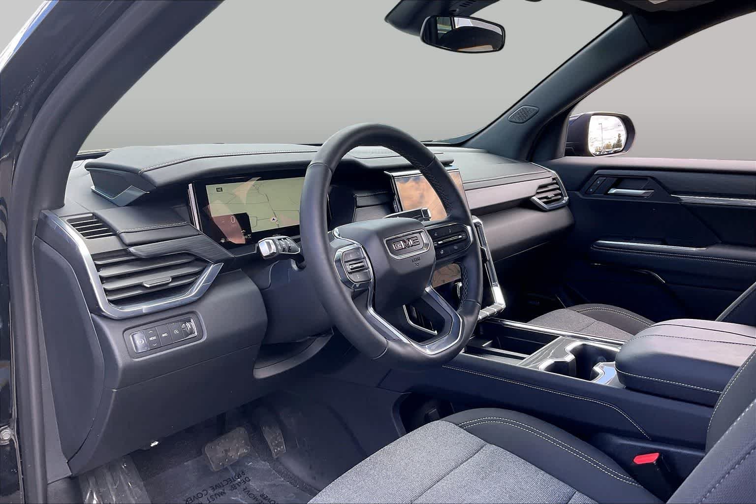 Used 2025 Ebony Twilight Metallic GMC AWD Elevation image 16
