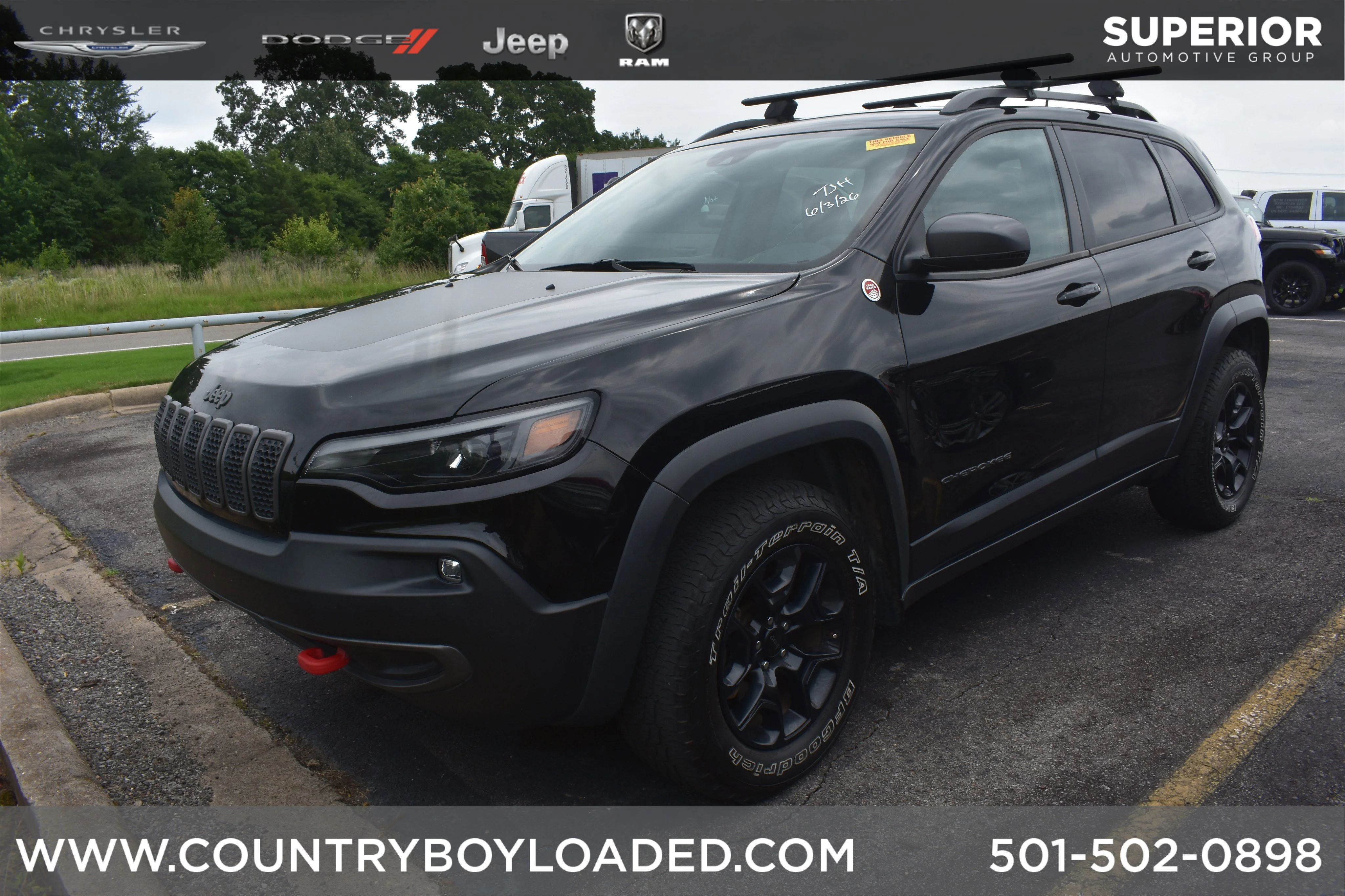 Used 2021 Diamond Black Crystal Pearlcoat Jeep Trailhawk image 1