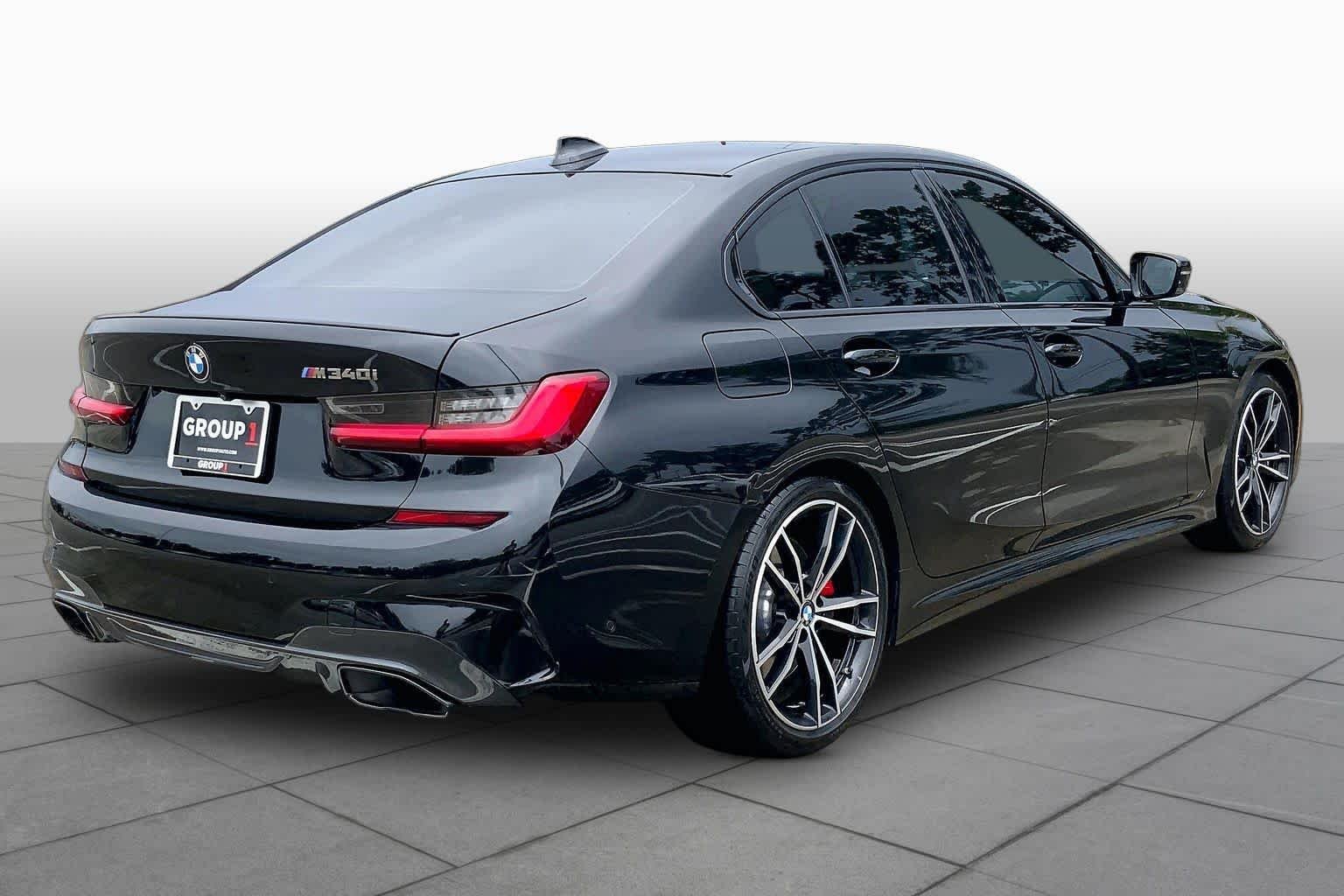 Used 2021 Black Sapphire Metallic BMW M340i image 13