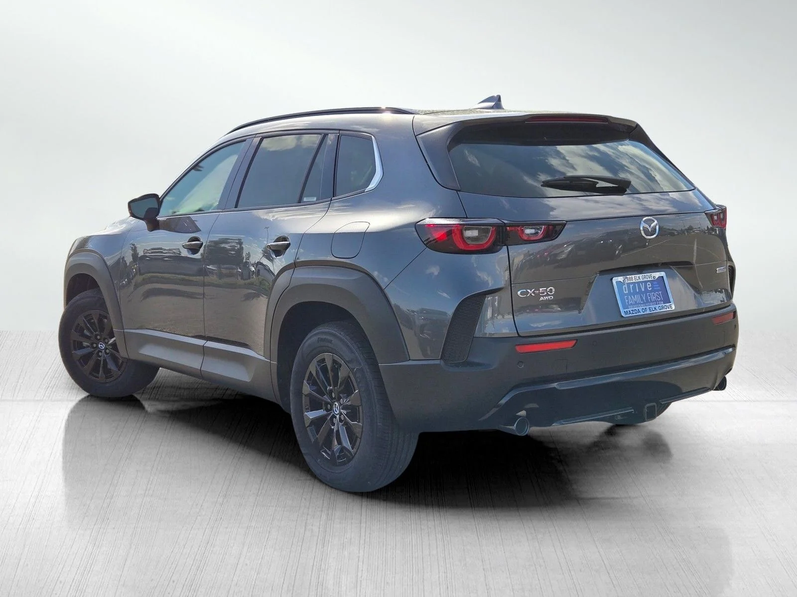 New 2026 Machine Gray Metallic Mazda Premium AWD image 6