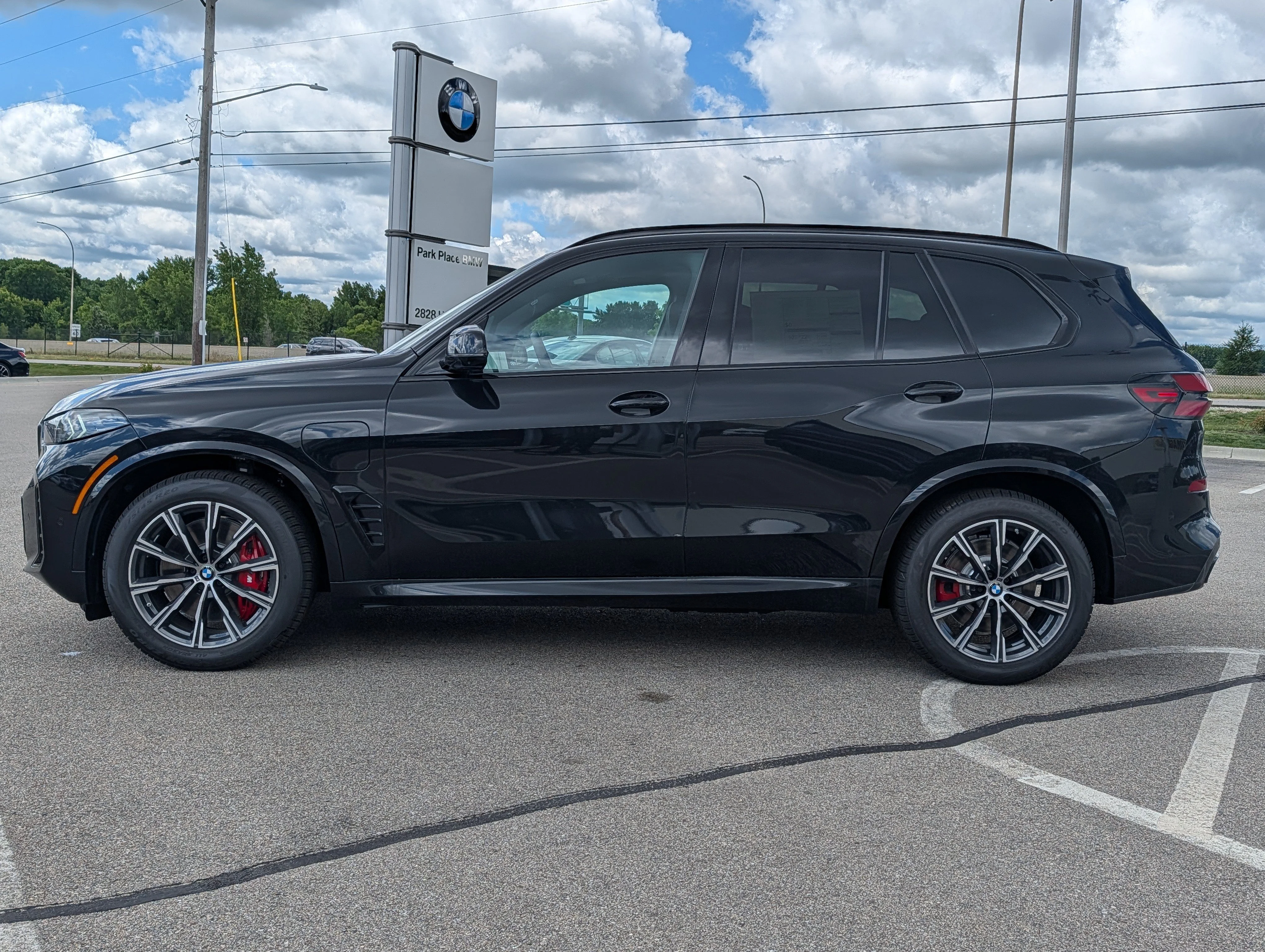 New 2026 Black Sapphire Metallic BMW xDrive50e image 3