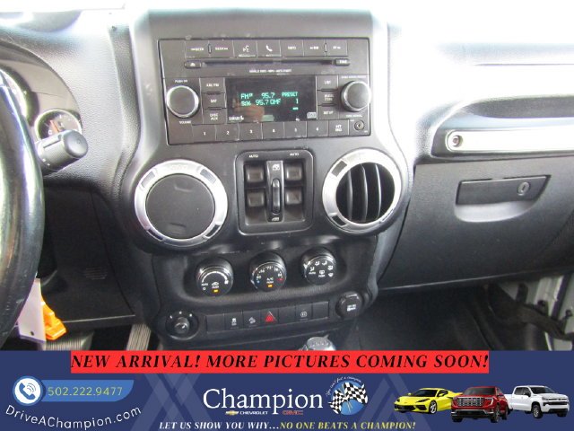Used 2012 Silver Jeep Unlimited Sahara image 12