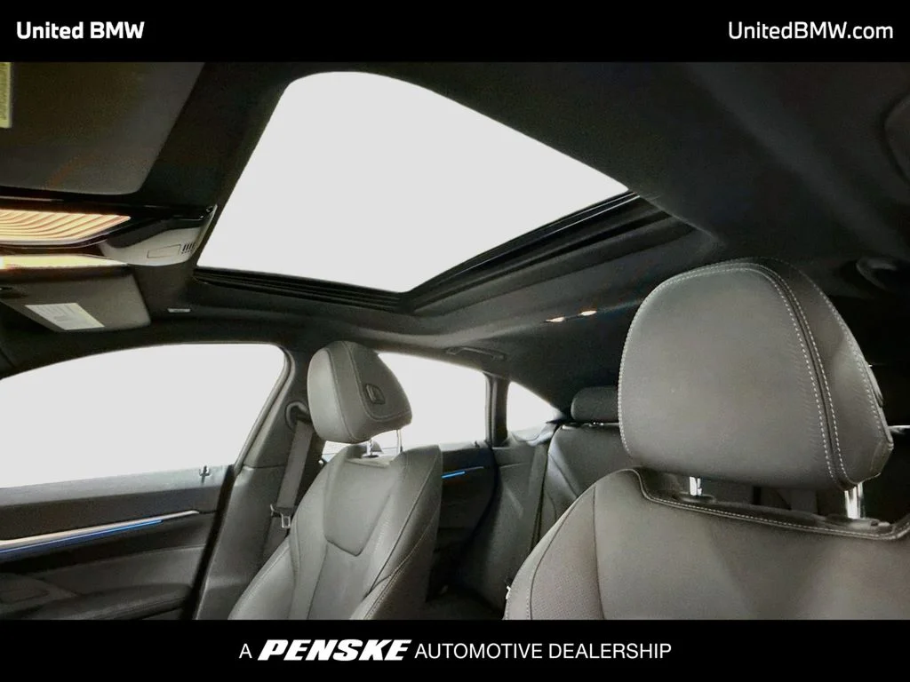 Certified Used 2023 Black Sapphire Metallic BMW eDrive40 image 12