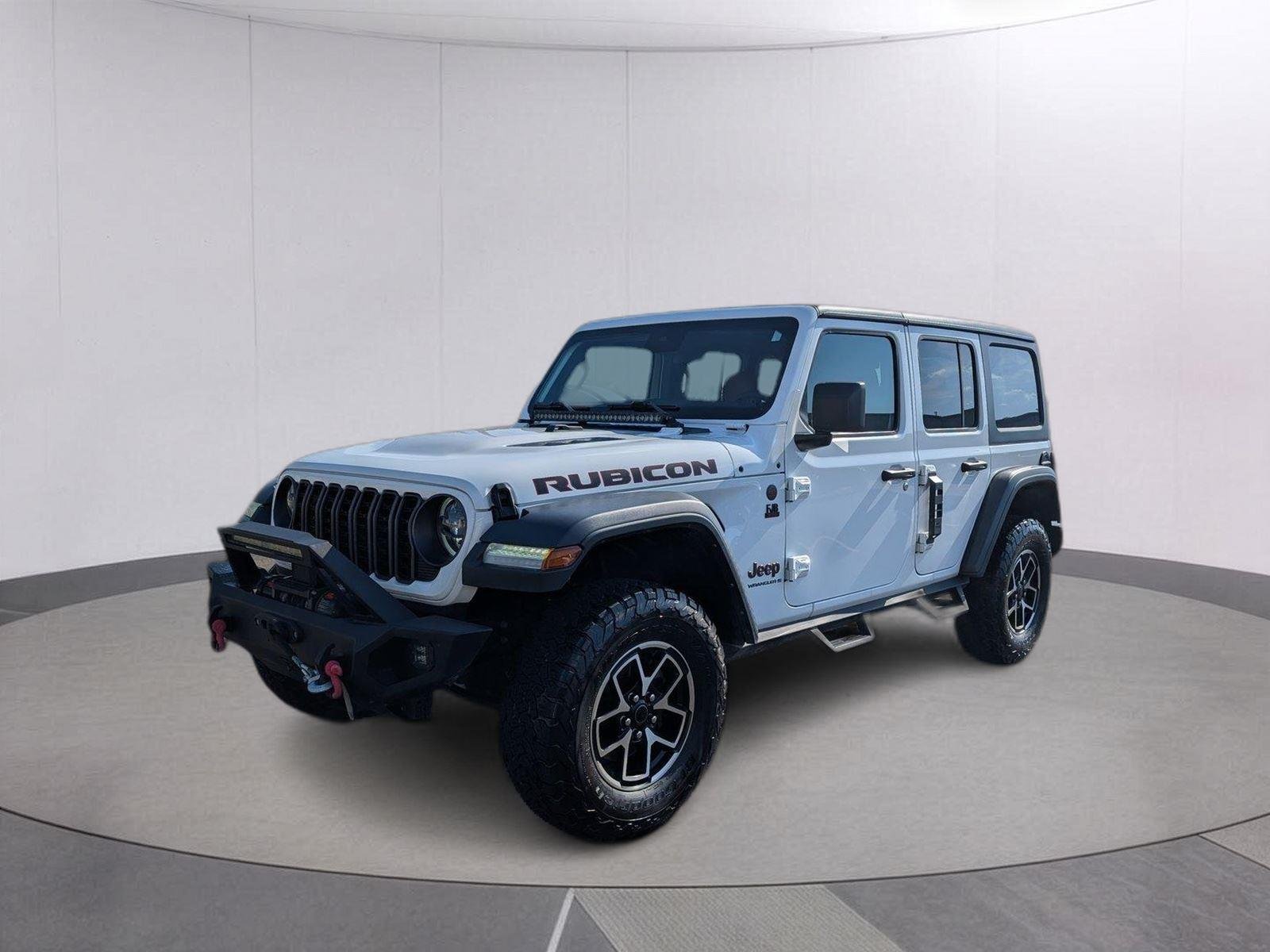 Used 2024 Bright White Clearcoat Jeep Rubicon image 1