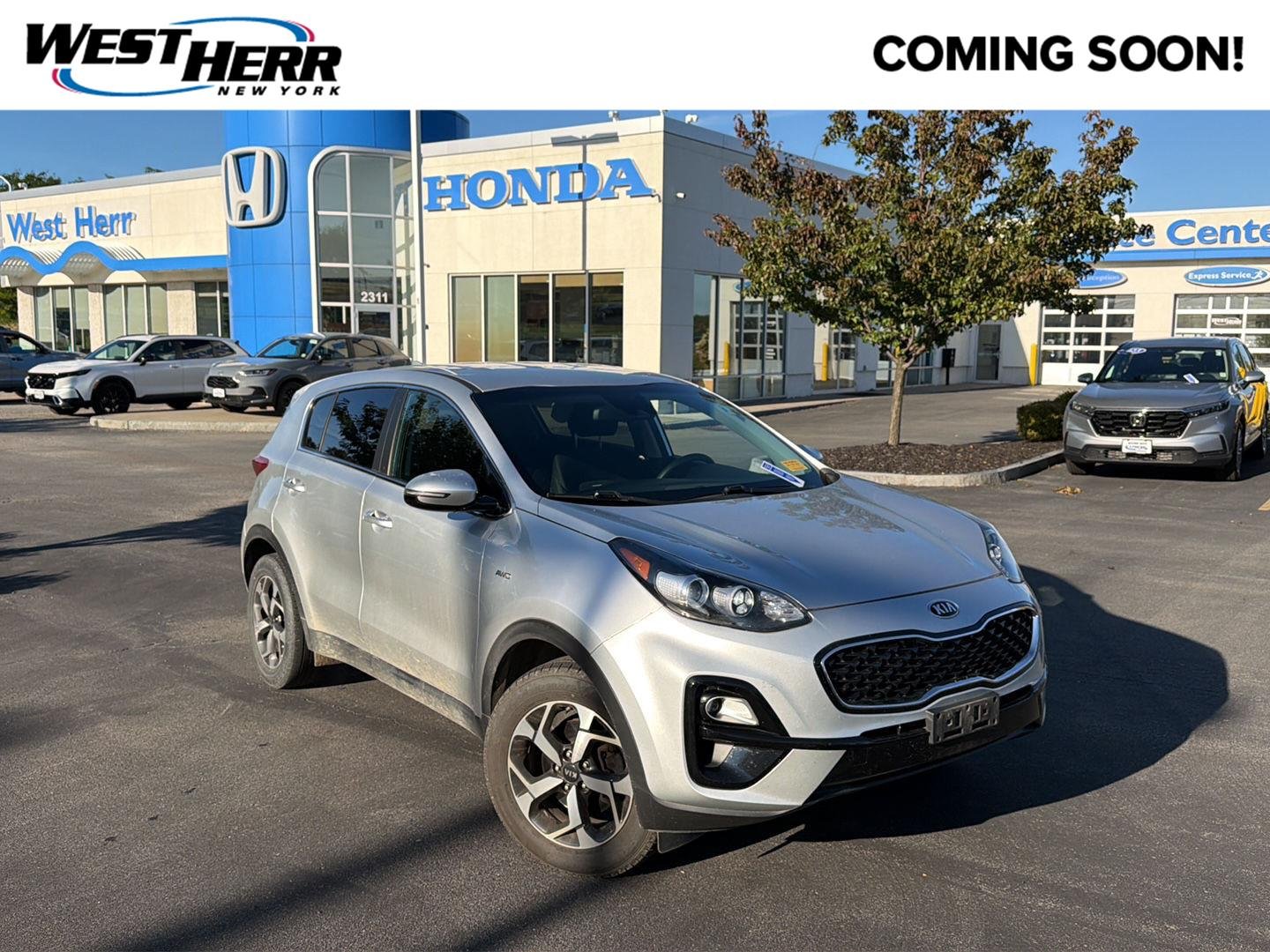 Used 2021 Sparkling Silver Kia LX image 1