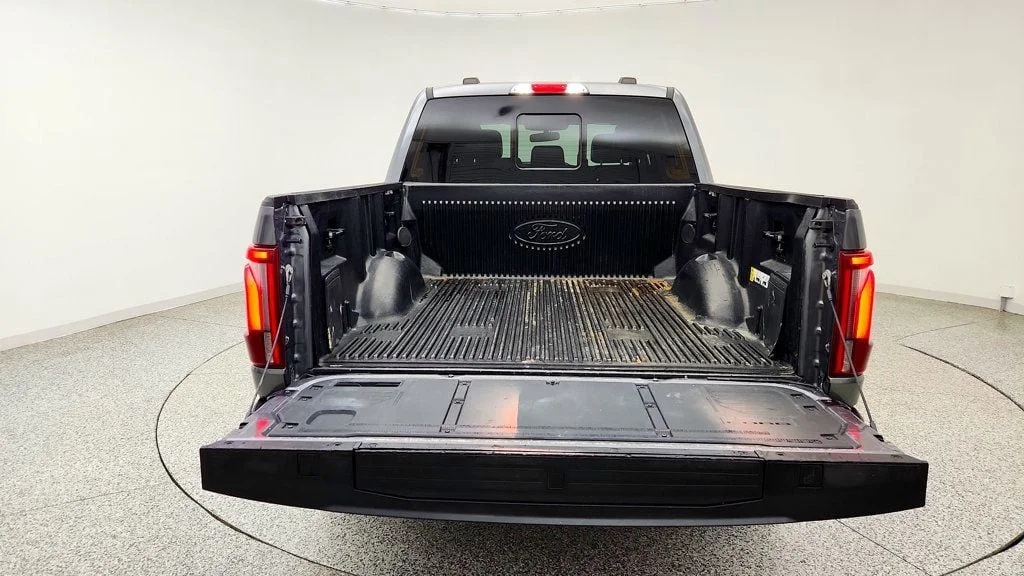Used 2024 Carbonized Gray Metallic Ford LARIAT 4WD SuperCrew 5.5