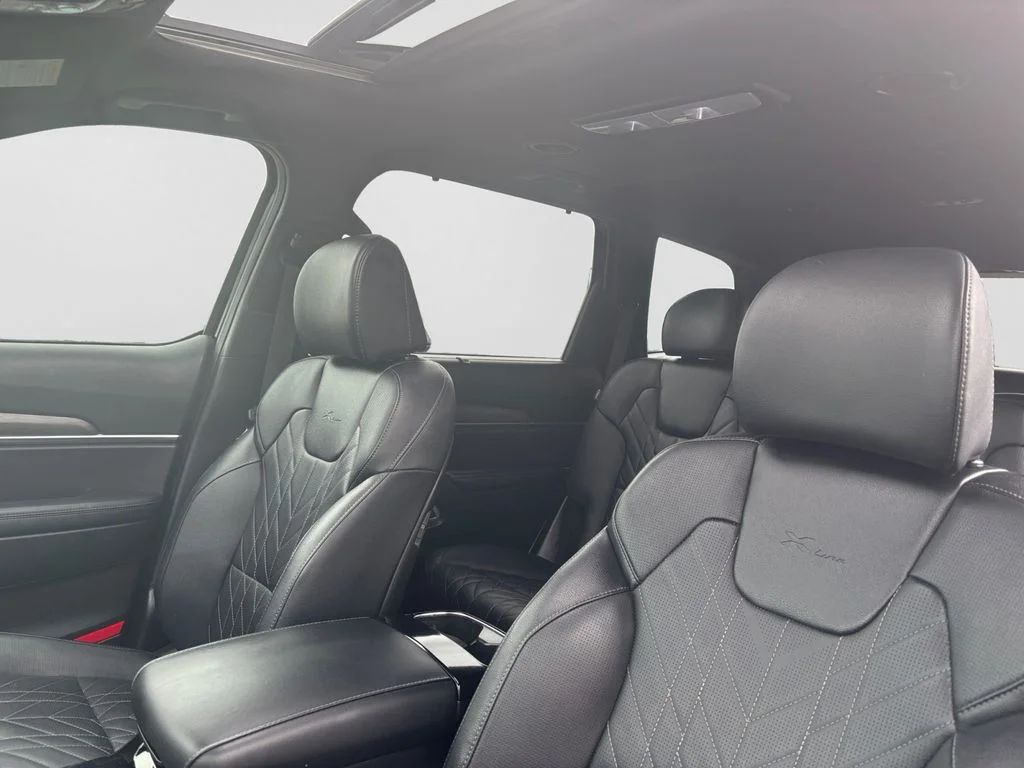 Used 2024 Black Kia EX X-Line image 16