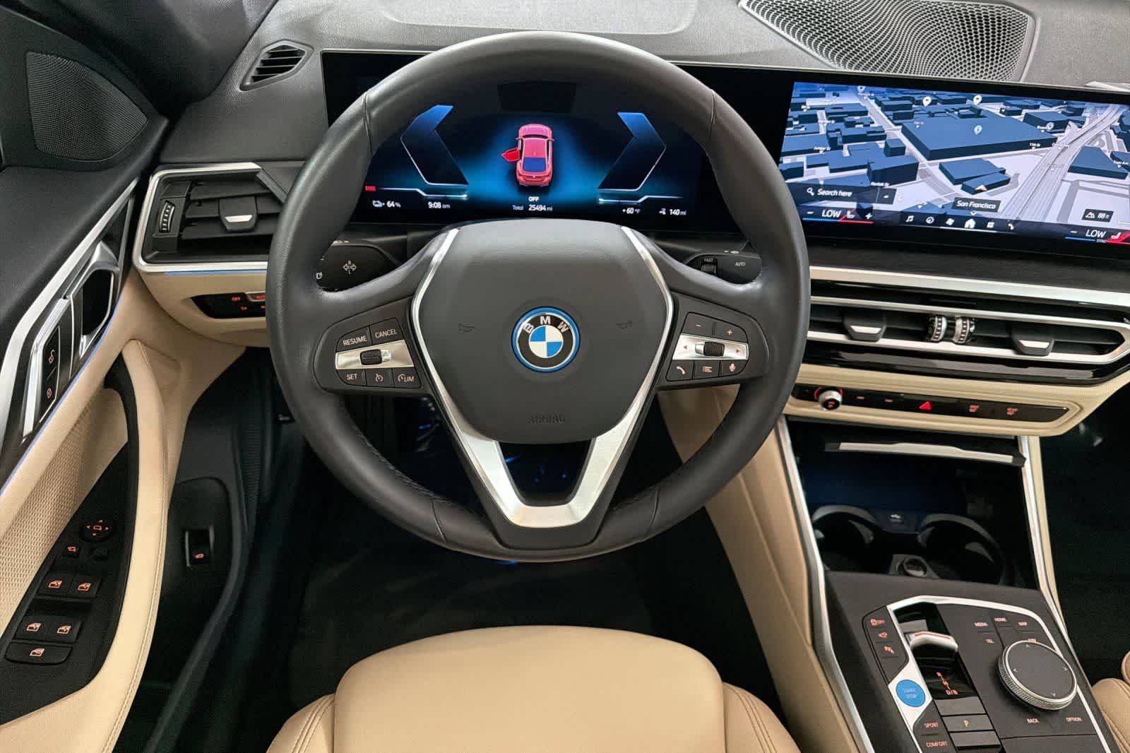Used 2024 Sunset Orange Metallic BMW eDrive40 image 14