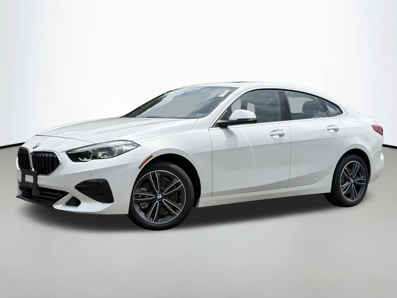 Used 2024 Mineral White Metallic BMW 228i xDrive image 1