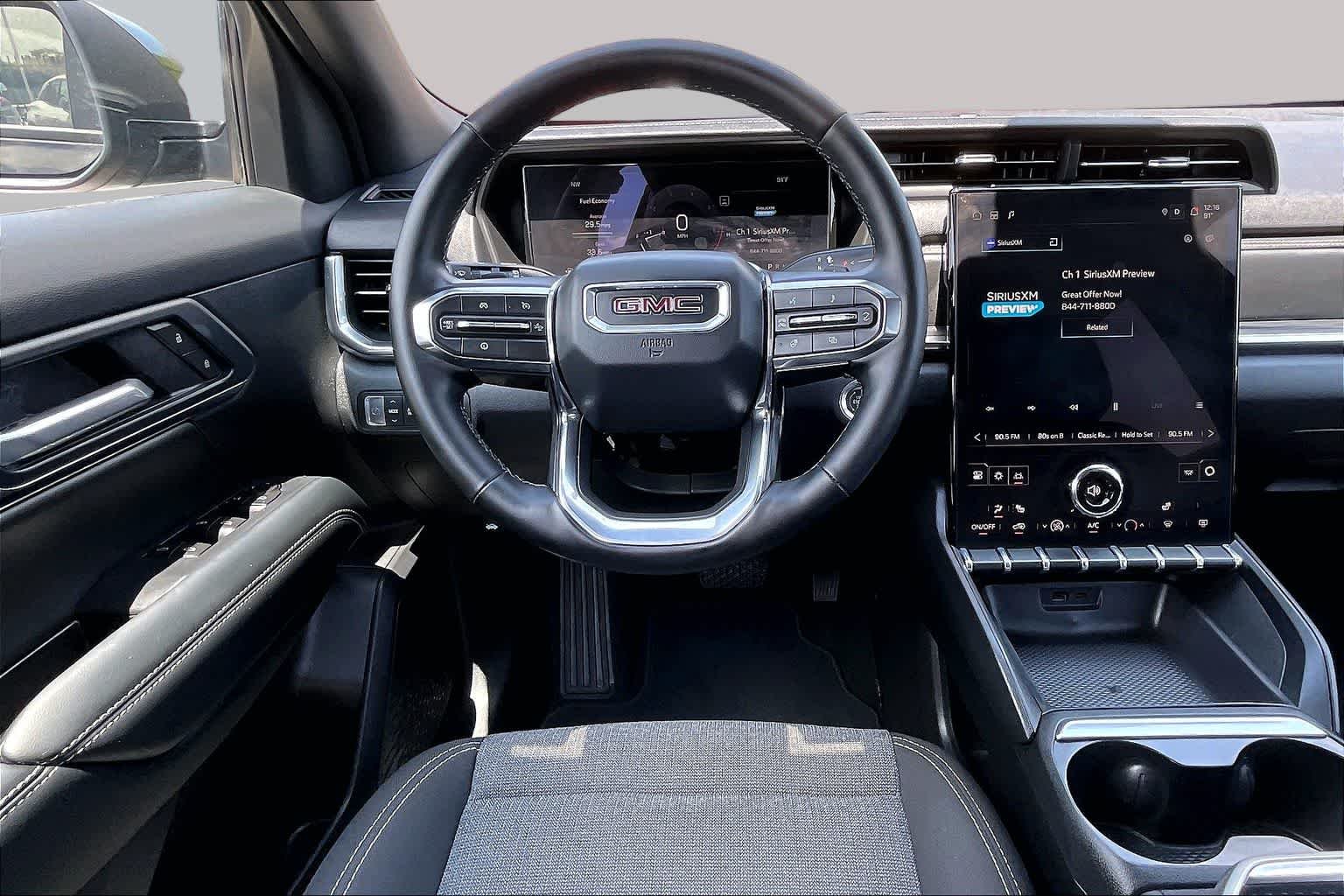 Used 2026 Ebony Twilight Metallic GMC FWD Elevation image 6
