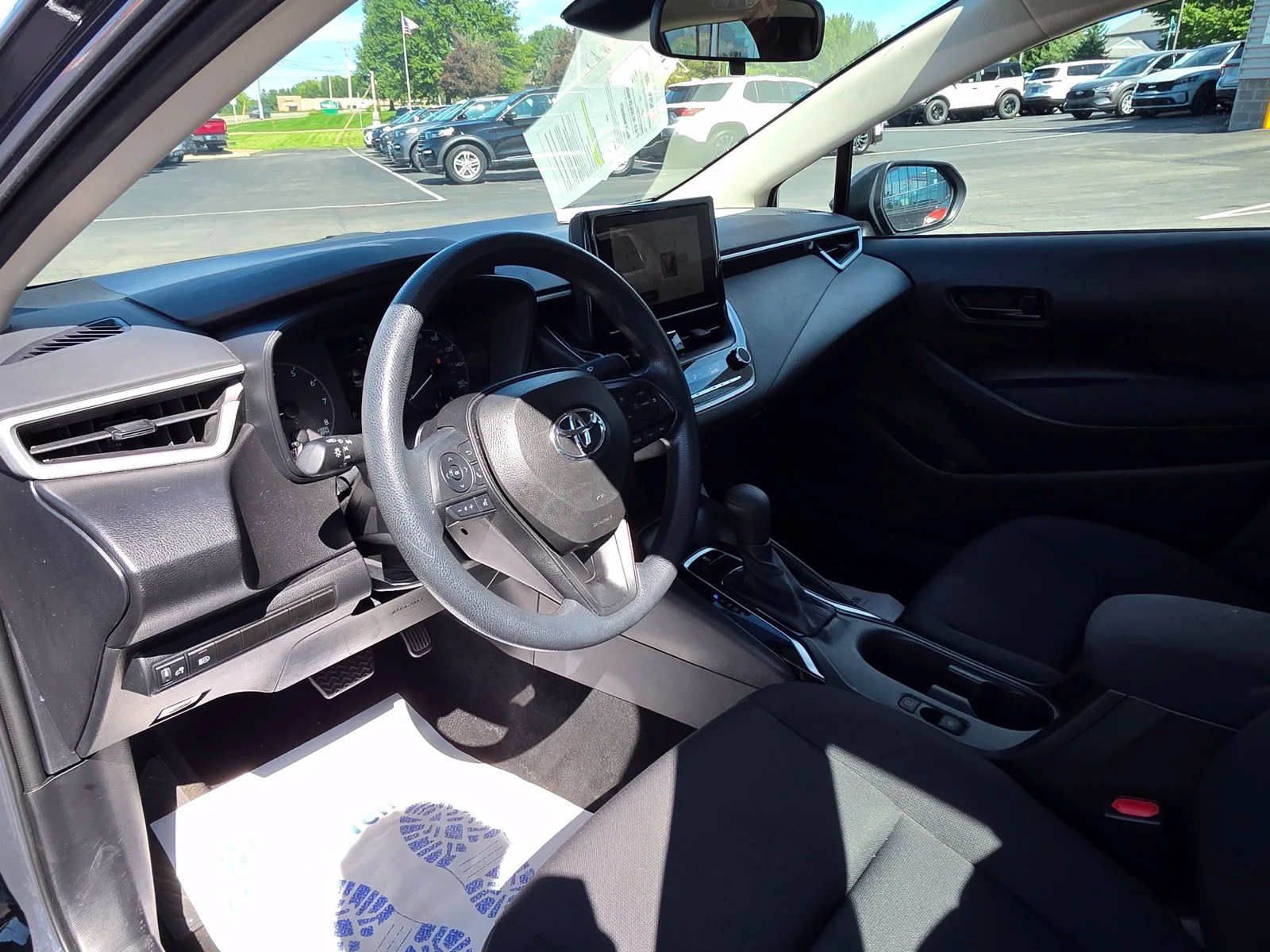 Used 2025 Black Toyota LE image 9