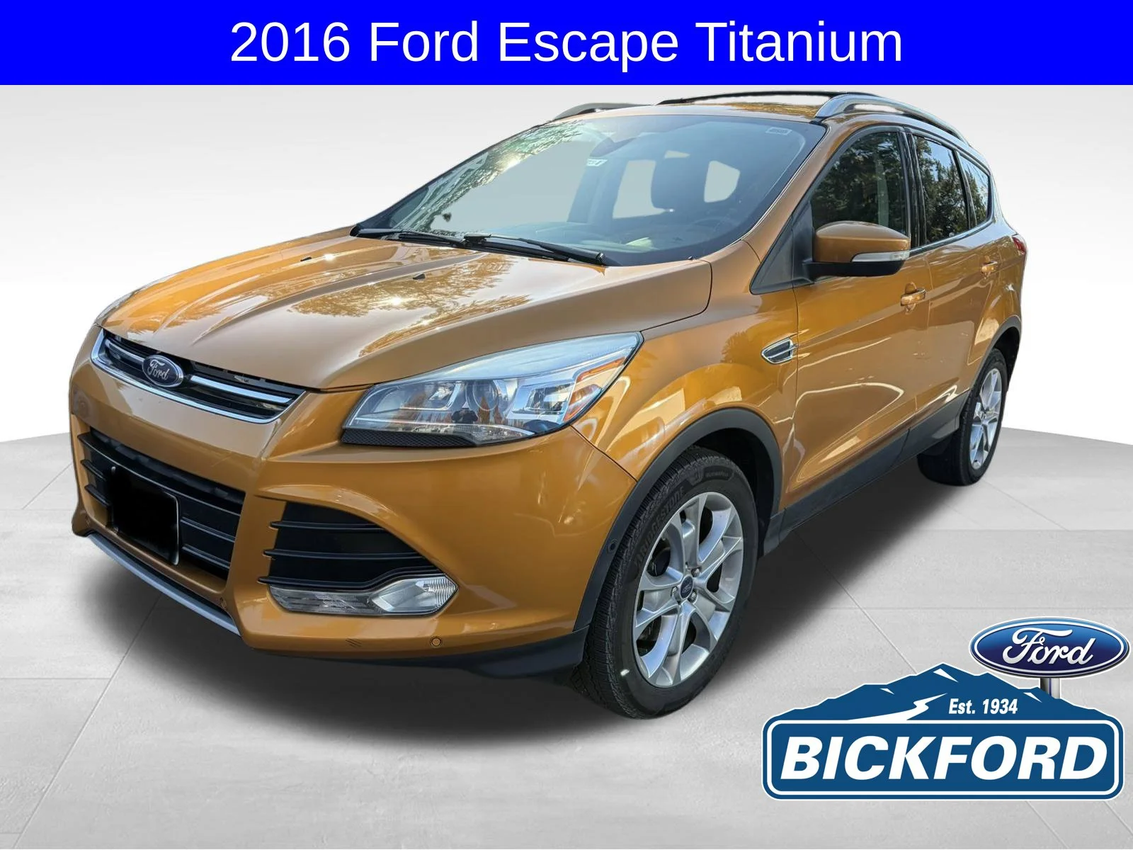 Used 2016 Yellow Ford Titanium image 1