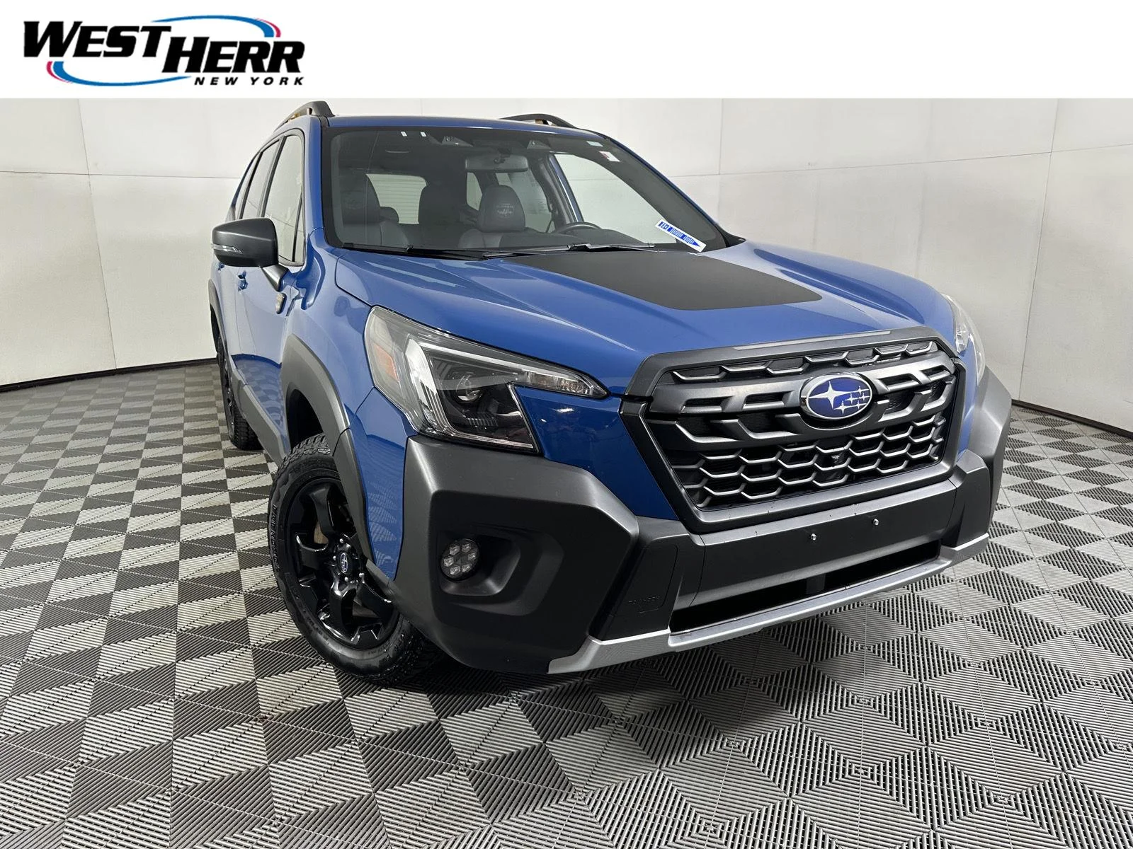 Used 2024 Geyser Blue Subaru Wilderness image 1