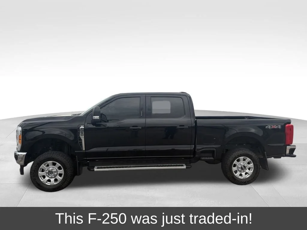 Certified Used 2023 Agate Black Metallic Ford XLT image 1
