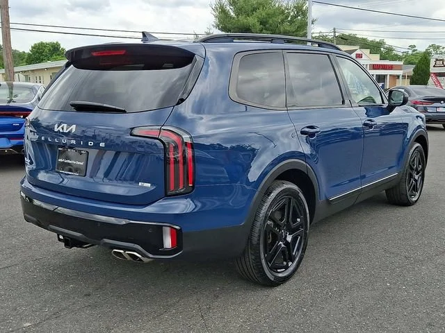 Used 2024 Blue Kia EX X-Line image 7