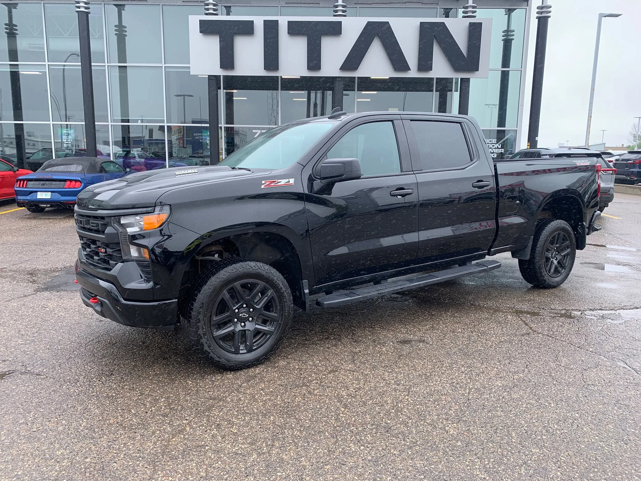 Certified Used 2024 Black Chevrolet Custom Trail Boss*3.0L Duramax | 6 Pass | Adaptive Cruise | Remote Start | 6ft Box | Tow Pkg image 2