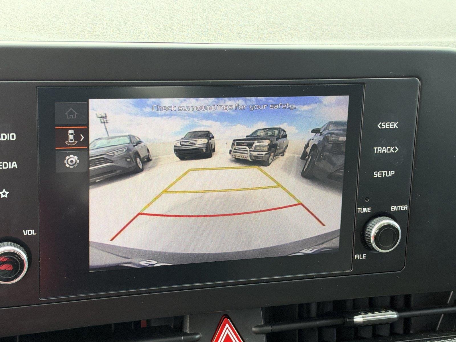 Certified Used 2025 Snow White Pearl Kia LX image 24