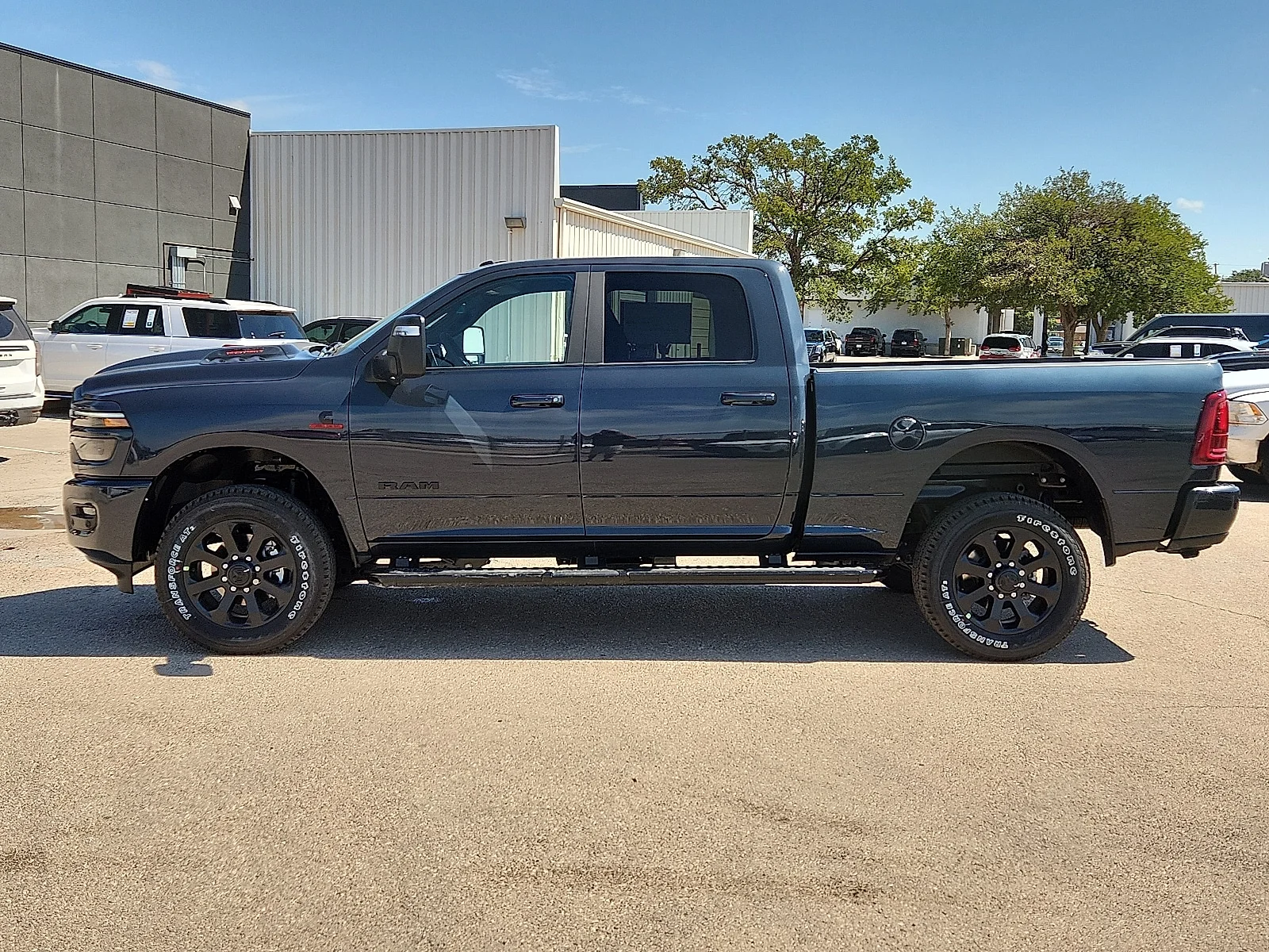 New 2026 Forged Blue Metallic  Paint Ram LARAMIE CREW CAB 4X4 6