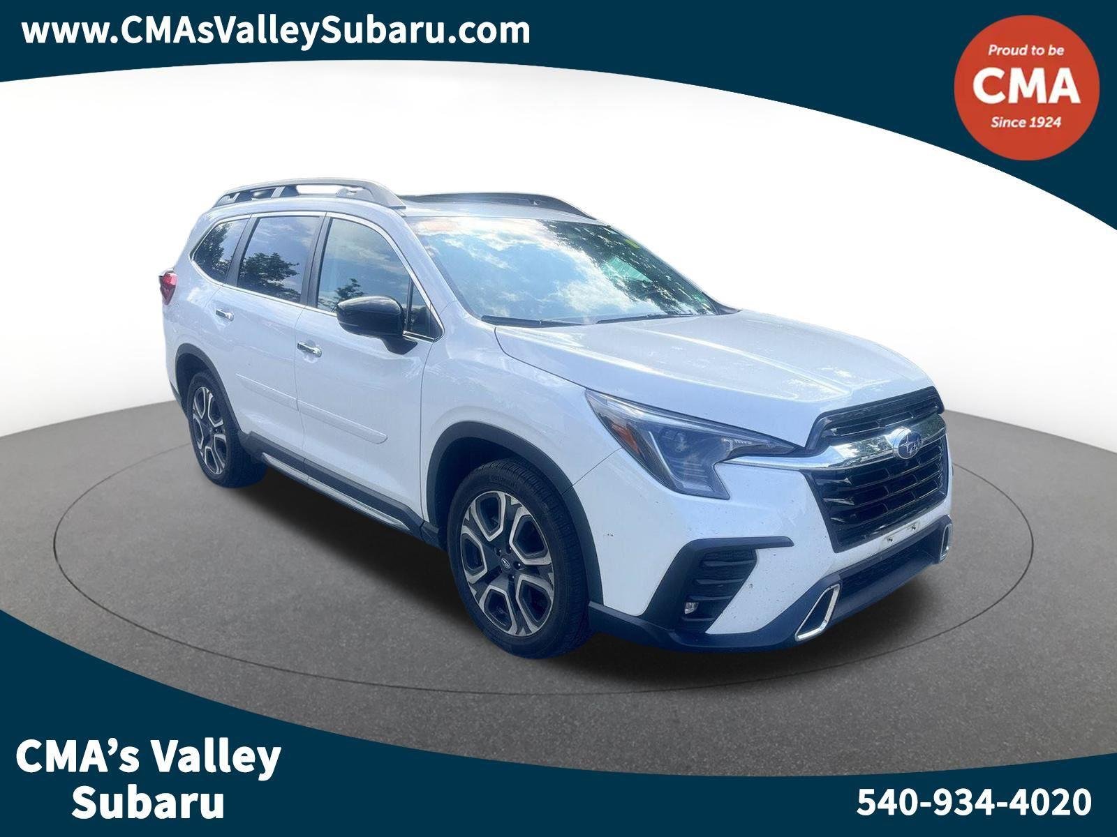 Used 2024 Crystal White Pearl Subaru Touring image 1