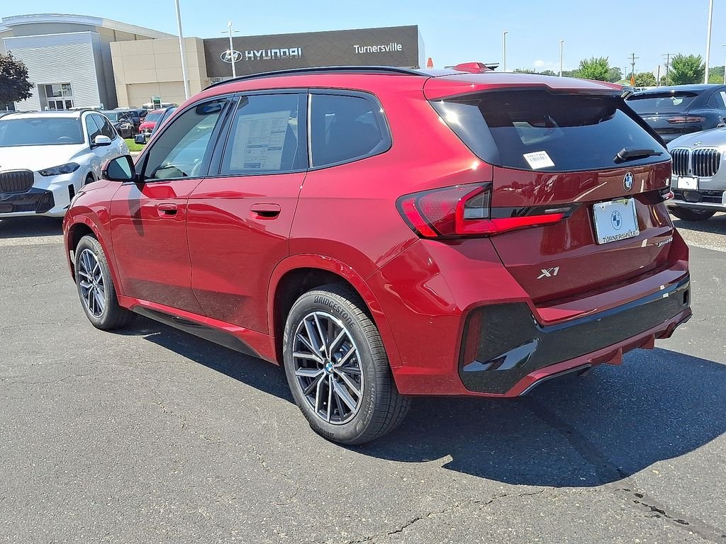 New 2026 Vegas Red Metallic BMW xDrive28i image 3