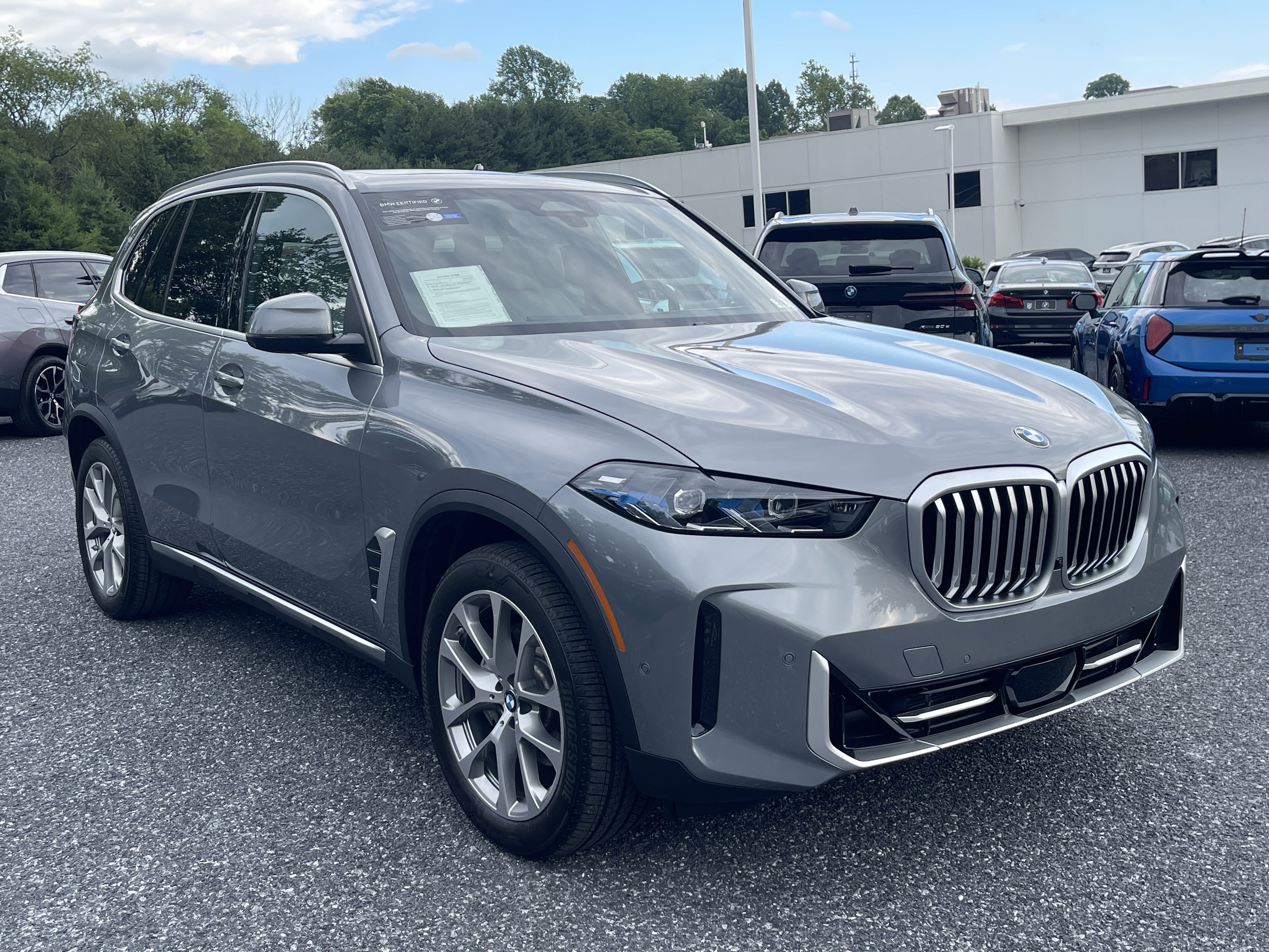 Certified Used 2025 Skyscraper Grey Metallic BMW xDrive40i image 3
