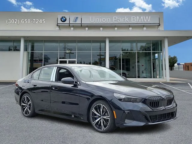 New 2027 Carbon Black Metallic BMW 550e xDrive image 3
