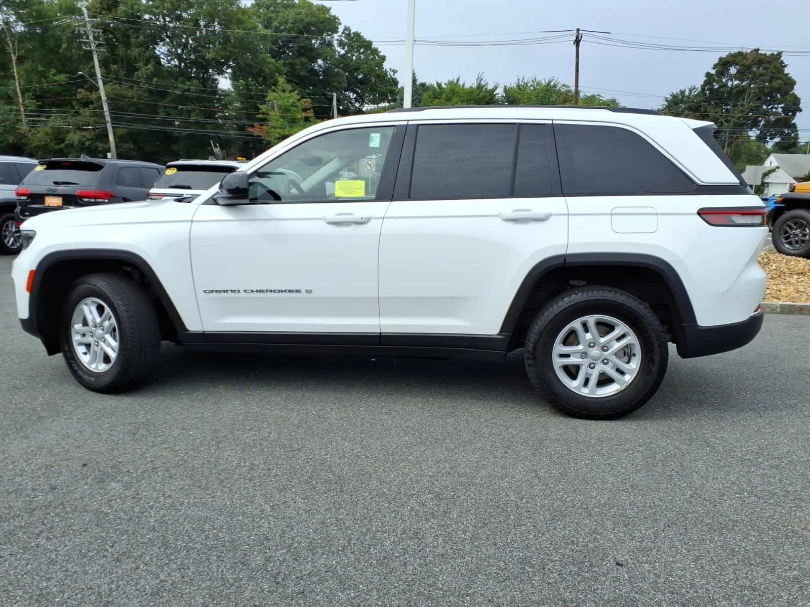 Used 2023 Bright White Clearcoat Jeep Laredo image 12