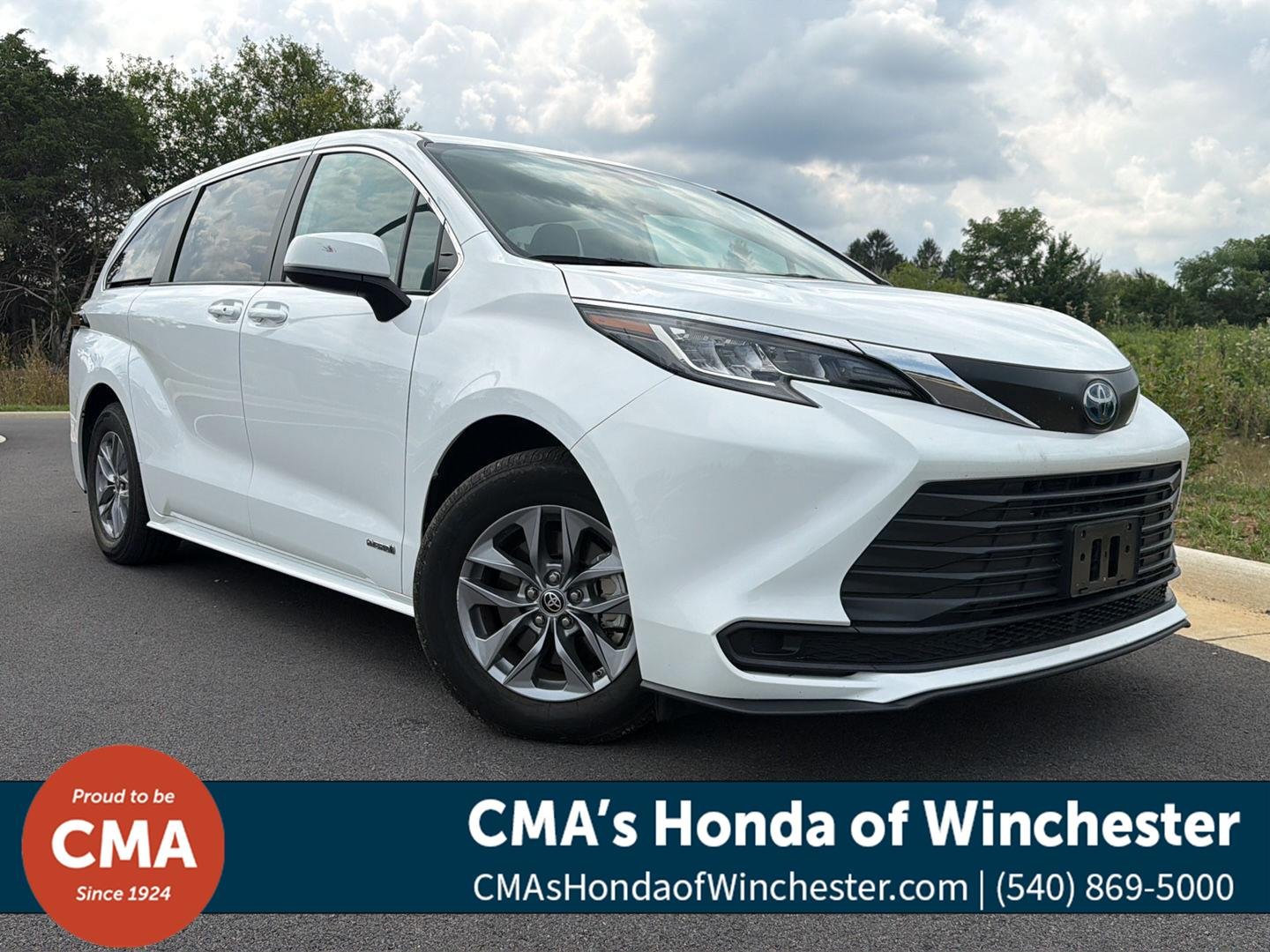 Used 2021 Super White Toyota LE image 1