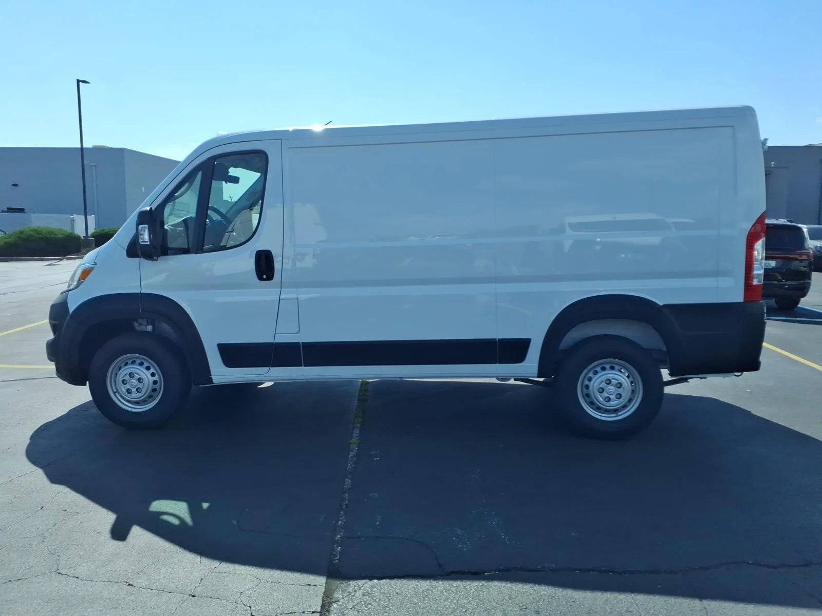 New 2027 Bright White Clearcoat RAM SLT image 3