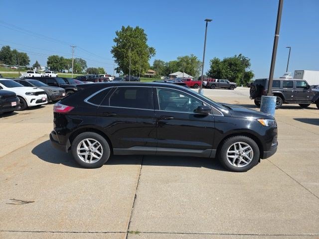 Used 2024 Agate Black Metallic Ford SEL image 8