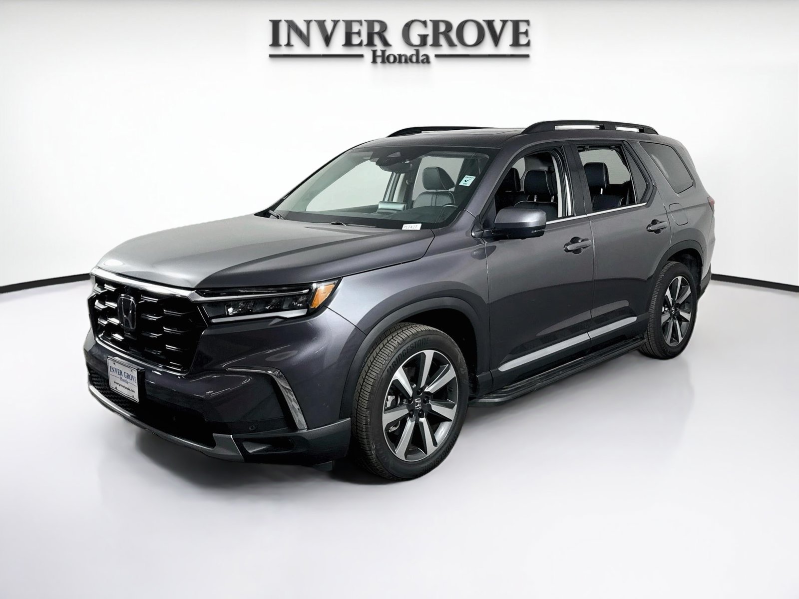 Certified Used 2025 Modern Steel Metallic Honda AWD Elite image 1