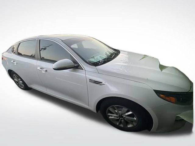 Used 2017 Snow White Pearl Kia LX image 1