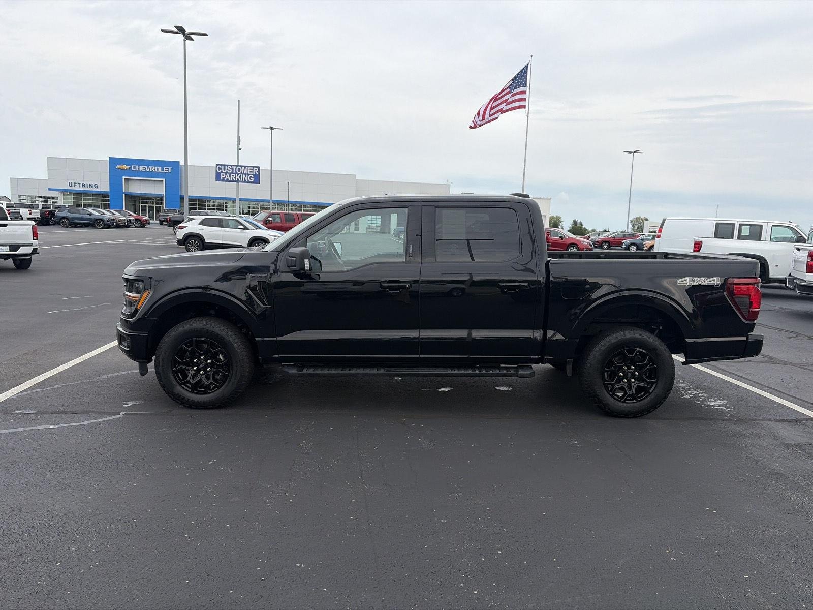 Used 2024 Agate Black Metallic Ford XLT image 7