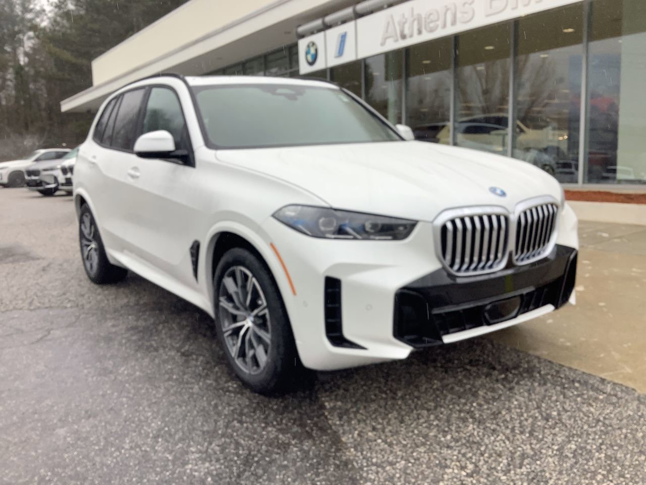 Used 2026 Mineral White Metallic BMW xDrive50e image 2