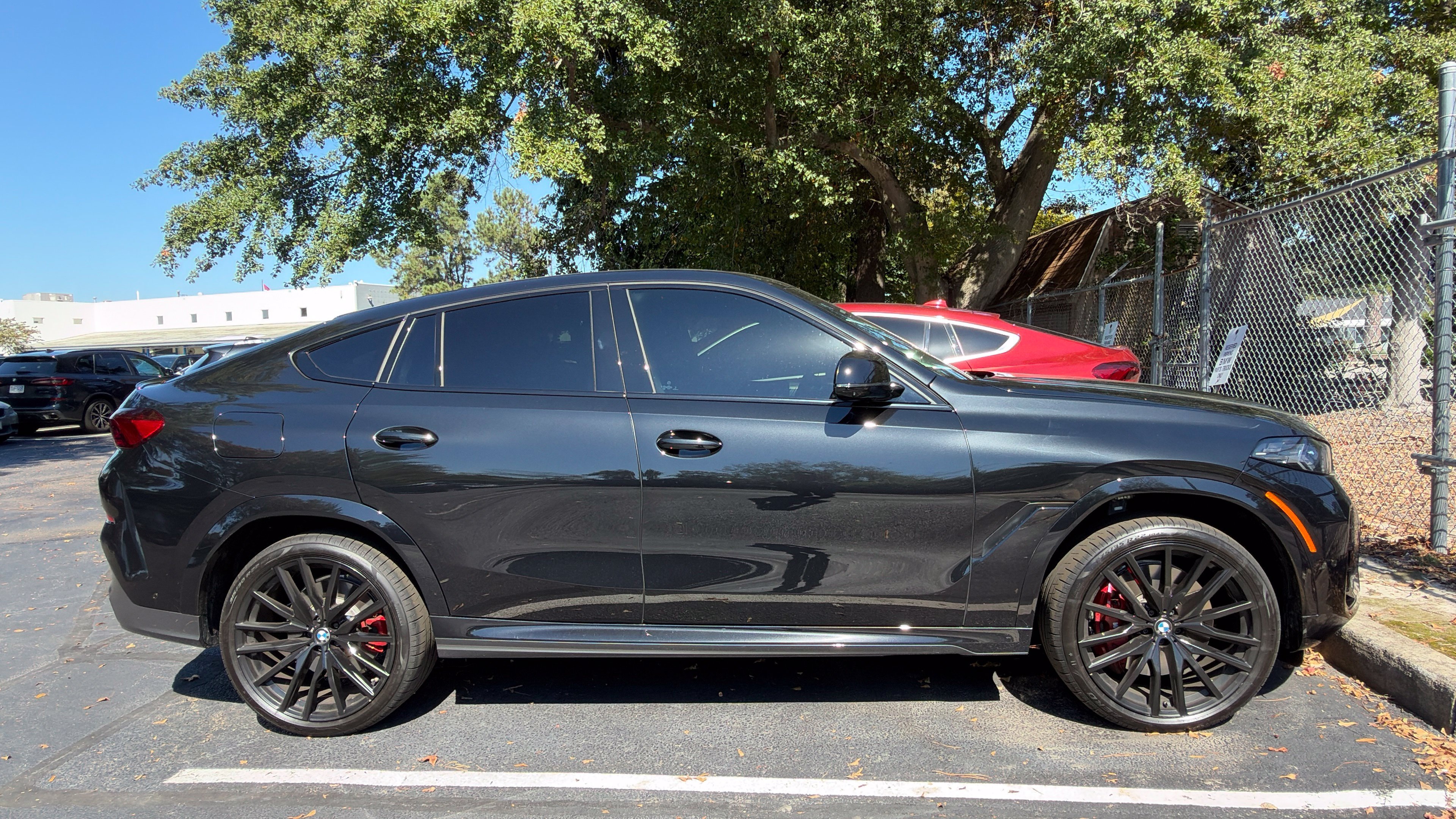 Used 2027 Black Sapphire Metallic BMW M60i image 4