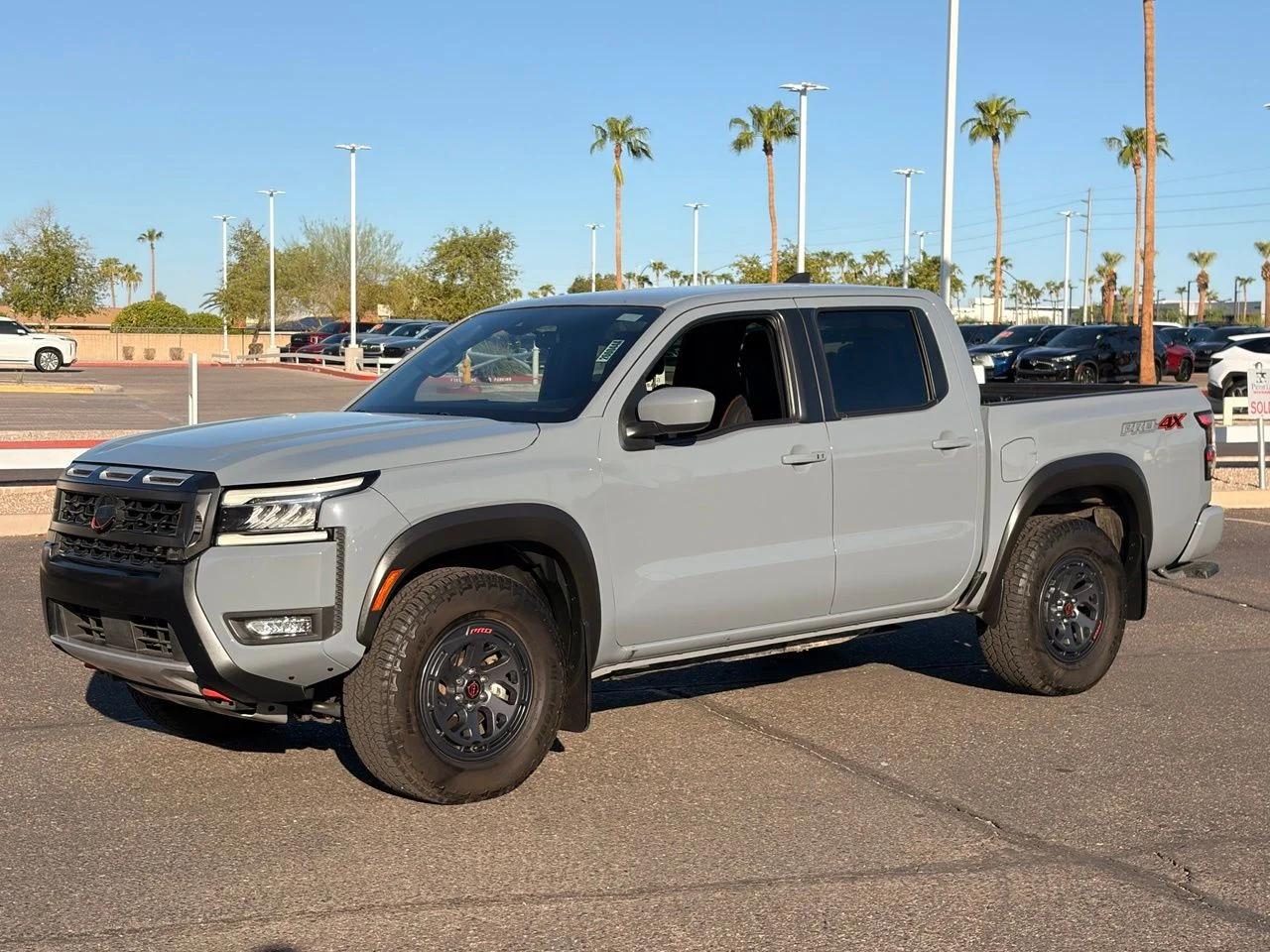 Used 2025 Boulder Gray Pearl Nissan PRO-4X image 1
