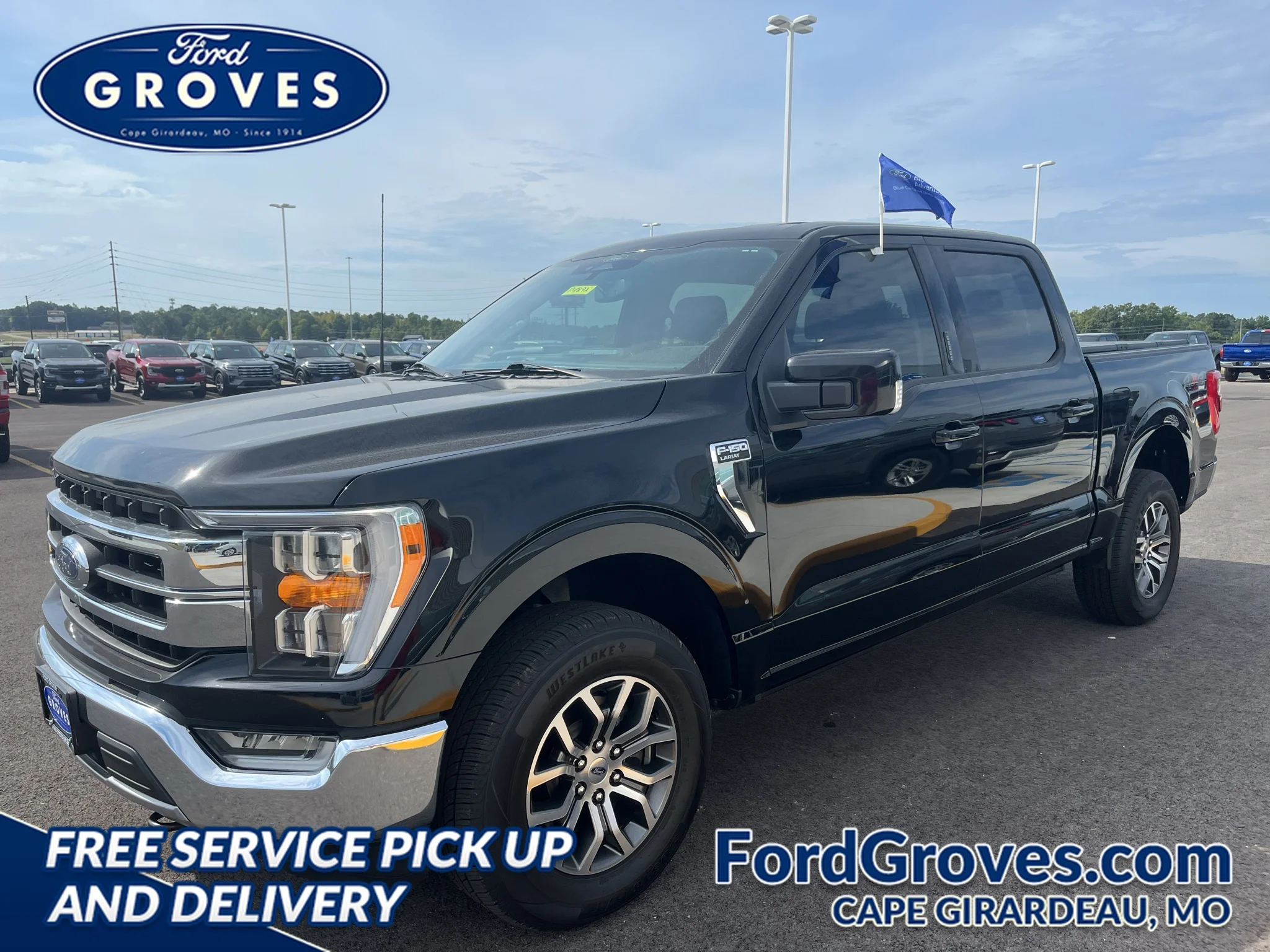 Used 2022 Agate Black Metallic Ford LARIAT image 1