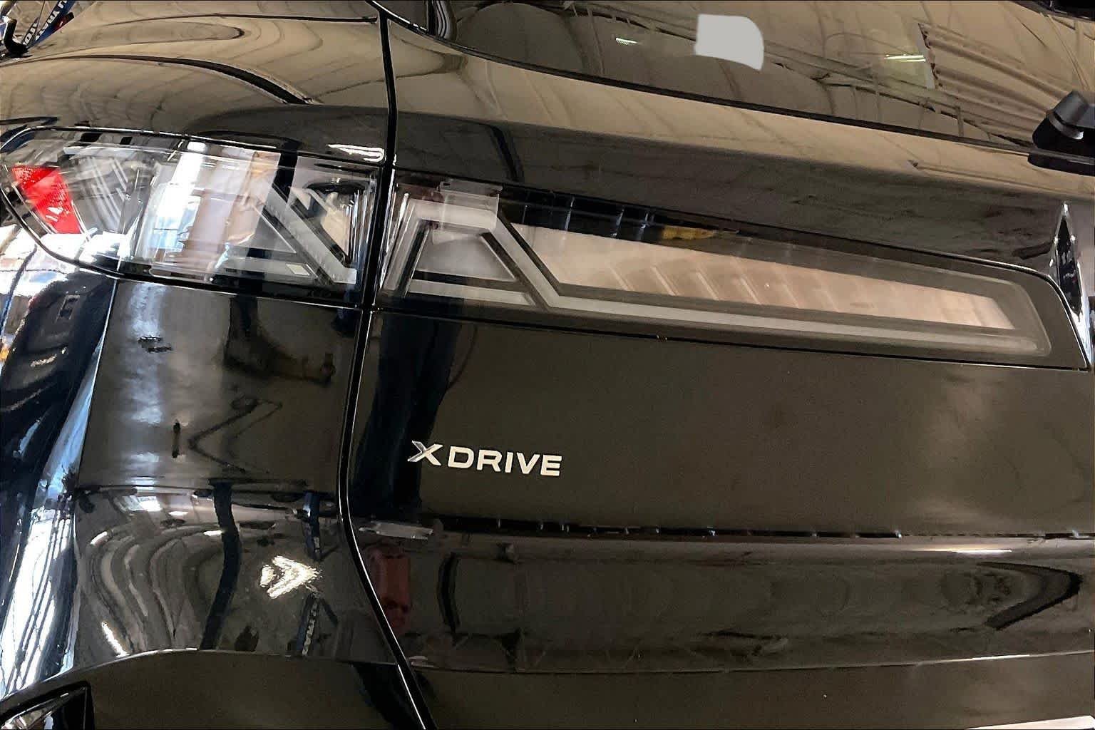 New 2027 Black Sapphire Metallic BMW 40 xDrive image 14