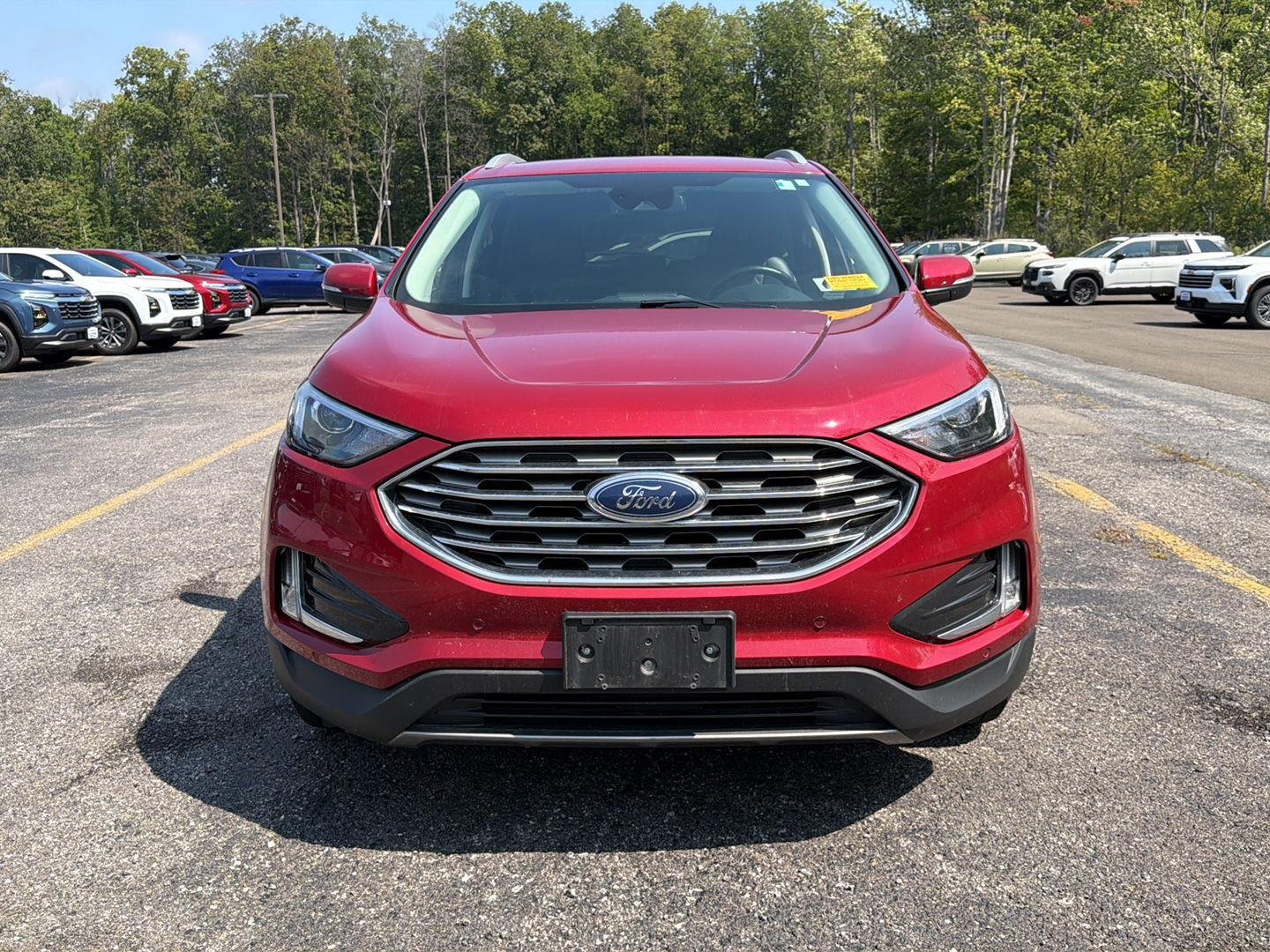 Used 2024 Rapid Red Metallic Tinted Clearcoat Ford Titanium image 8
