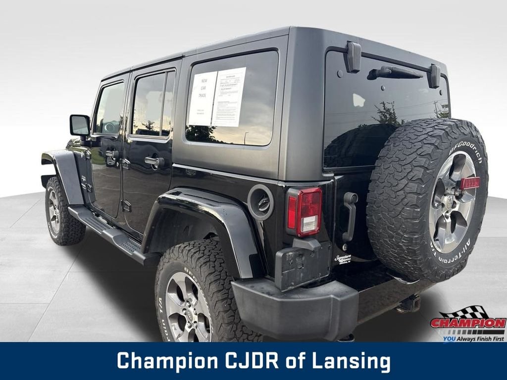 Used 2016 Black Jeep Unlimited Sahara image 5