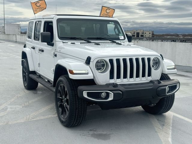 Certified 2021 Jeep Wrangler Unlimited Sahara 4XE with VIN 1C4JJXP6XMW700972 for sale in Brooklyn, NY