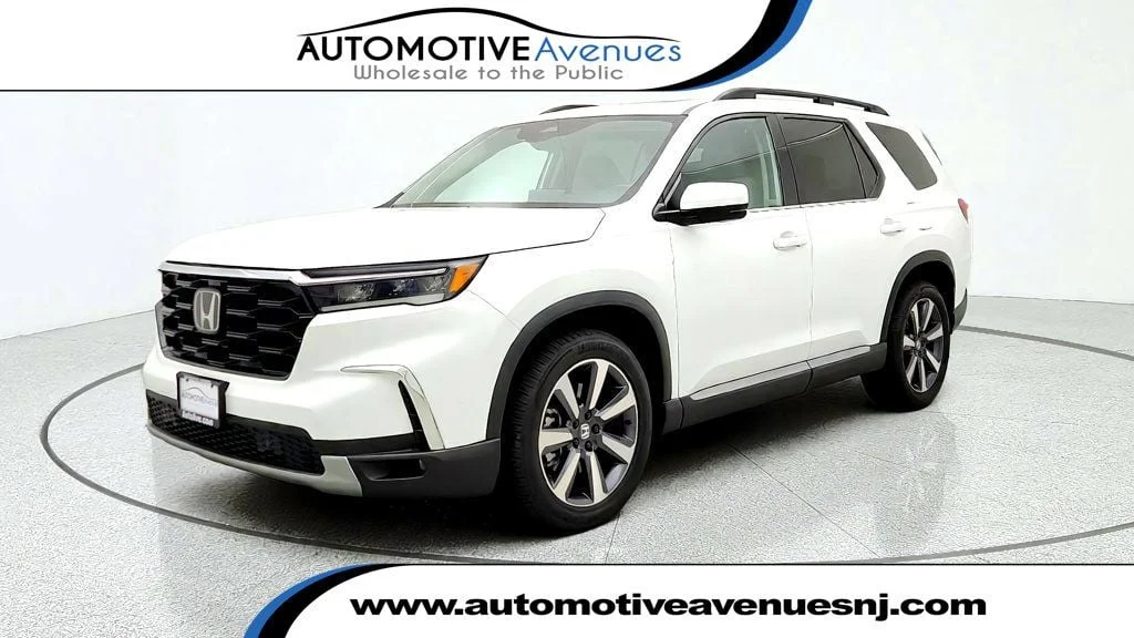 Used 2024 Platinum White Pearl Honda Touring AWD image 1