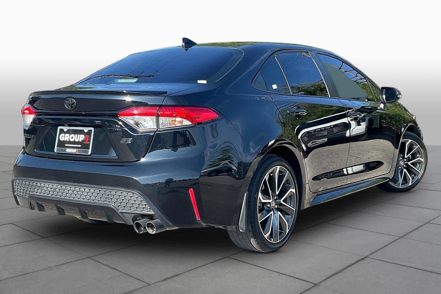 Used 2022 Black Sand Pearl Toyota SE image 13