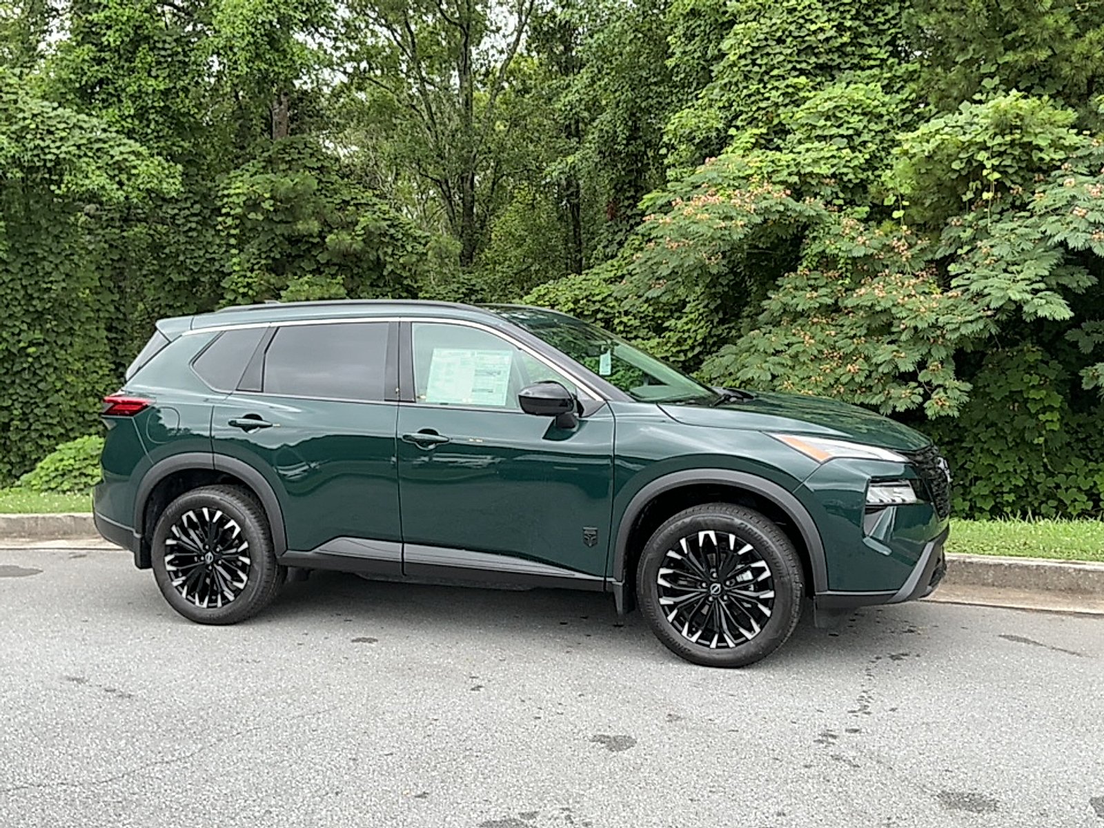 New 2026 Obsidian Green Nissan Dark Armor image 1