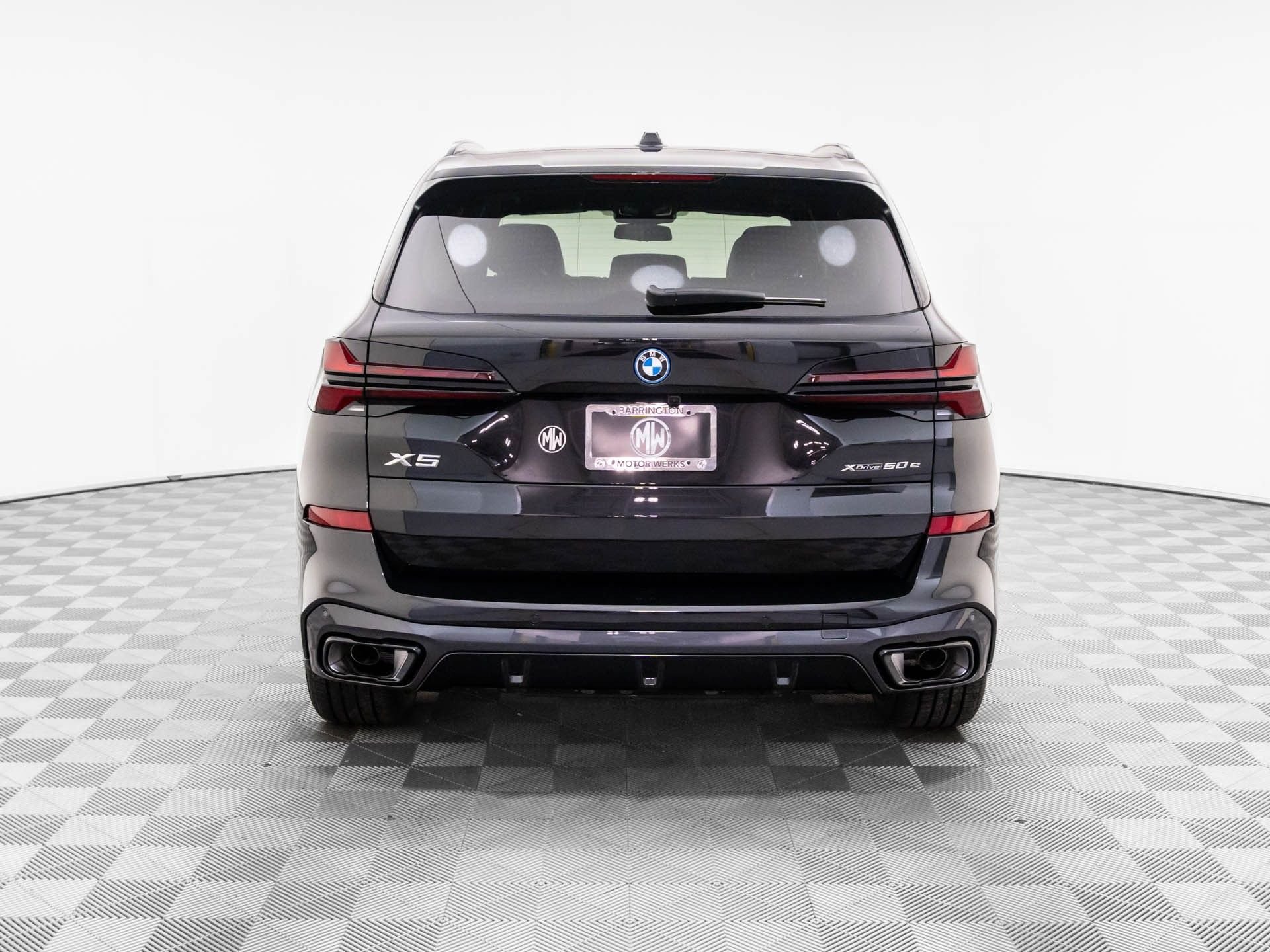 New 2026 Black Sapphire Metallic BMW xDrive50e image 5