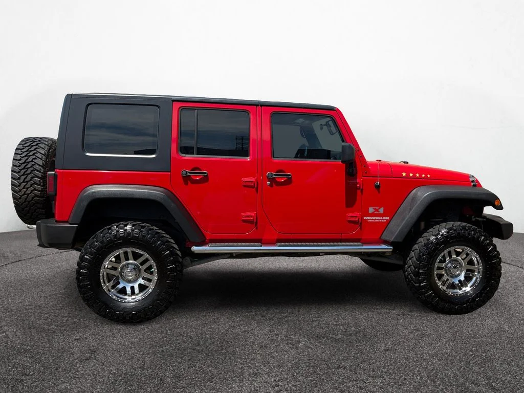 Used 2009 Red Jeep Unlimited X image 6