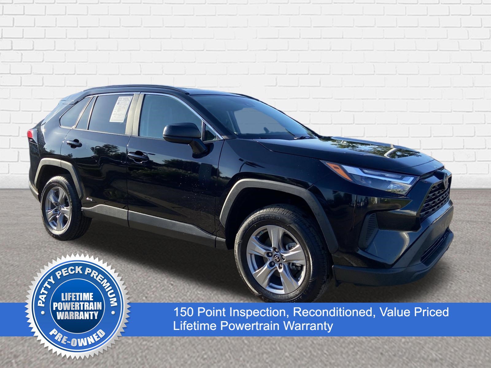 Used 2023 Midnight Black Metallic Toyota Hybrid LE image 1